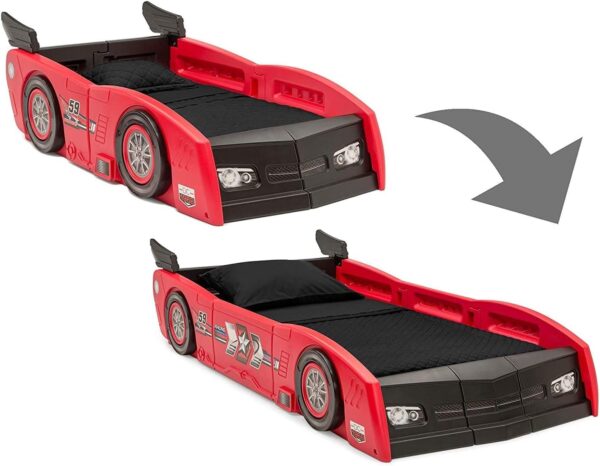 Delta Children Toddler Bed To Twin Bed - Grand Prix Race Car Bed. This 2-in-1 bed transforms from a cozy toddler haven to a spacious twin, featuring a sleek race car design. Made in the USA for safety & built to last!