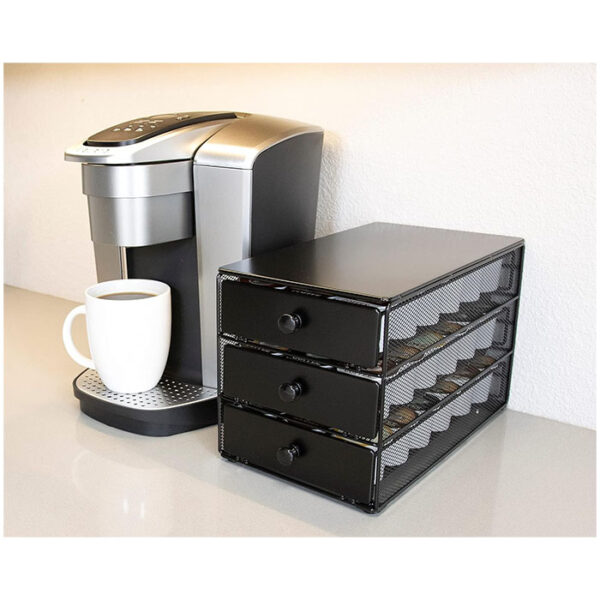 Organize your K-Cups in style with the Nifty Coffee Pod Drawer. This 3-tier drawer offers ample storage, a sleek design, and easy access to your favorite coffee pods. Transform your countertop and elevate your coffee experience.  Black Satin Finish, Compatible with K-Cups, 54 Pod Pack Capacity Rack, 3-Tier Holder & Storage, Stylish Home or Office Kitchen Counter Organizer.